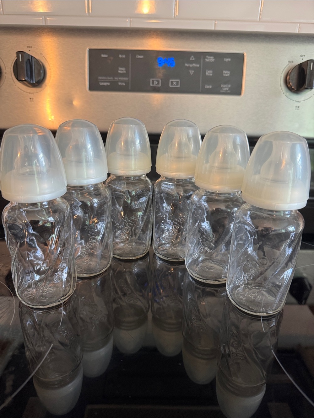 Set of 6 Clear Glass Baby Bottles with Cream Caps